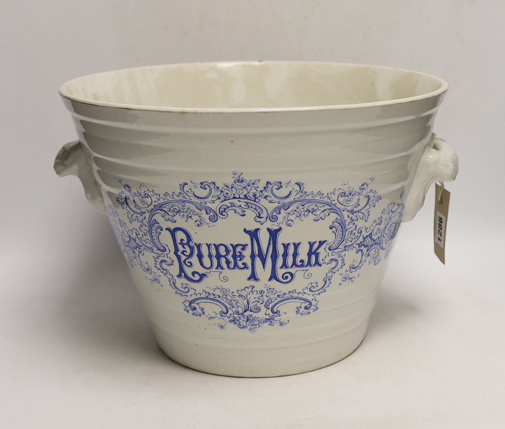 An Edwardian Dairy Outfit Co ironstone advertising Pure Milk pail, diameter 32.5cm